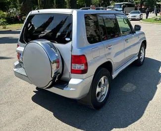 Autohuur Mitsubishi Pajero Io 2006 in in Georgië, met Benzine brandstof en 130 pk ➤ Vanaf 80 GEL per dag.