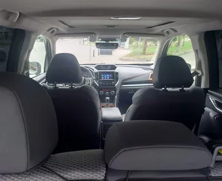 Interieur van Subaru Forester Limited te huur in Georgië. Een geweldige auto met 5 zitplaatsen en een Automatisch transmissie.