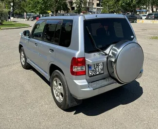 Verhuur Mitsubishi Pajero Io. Economy, Comfort, SUV Auto te huur in Georgië ✓ Borg van Zonder Borg ✓ Verzekeringsmogelijkheden TPL, FDW, Diefstal, Buitenland.