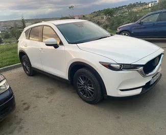 Vooraanzicht van een huurauto Mazda CX-5 in Tbilisi, Georgië ✓ Auto #7025. ✓ Transmissie Automatisch TM ✓ 1 beoordelingen.