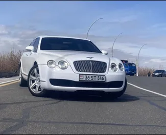 Vooraanzicht van een huurauto Bentley Flying Spur in Jerevan, Armenië ✓ Auto #6771. ✓ Transmissie Automatisch TM ✓ 0 beoordelingen.