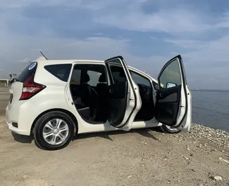 Verhuur Nissan Note. Economy, Comfort Auto te huur in Cyprus ✓ Borg van Zonder Borg ✓ Verzekeringsmogelijkheden TPL, CDW, SCDW, Passagiers, Diefstal, Jonge.