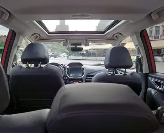 Interieur van Subaru Forester Limited te huur in Georgië. Een geweldige auto met 5 zitplaatsen en een Automatisch transmissie.