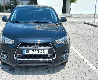 Vooraanzicht van een huurauto Mitsubishi Outlander Sport in Tbilisi, Georgië ✓ Auto #7178. ✓ Transmissie Automatisch TM ✓ 2 beoordelingen.