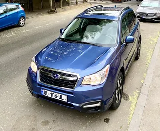 Vooraanzicht van een huurauto Subaru Forester in Tbilisi, Georgië ✓ Auto #7166. ✓ Transmissie Automatisch TM ✓ 2 beoordelingen.