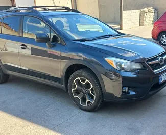 Vooraanzicht van een huurauto Subaru Crosstrek in Tbilisi, Georgië ✓ Auto #7316. ✓ Transmissie Automatisch TM ✓ 1 beoordelingen.