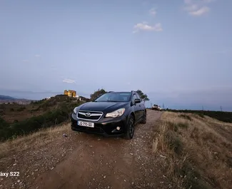 Vooraanzicht van een huurauto Subaru Crosstrek in Tbilisi, Georgië ✓ Auto #7212. ✓ Transmissie Automatisch TM ✓ 0 beoordelingen.