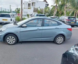 Vooraanzicht van een huurauto Hyundai Accent Sport Sedan in Mauritius, Mauritius ✓ Auto #7122. ✓ Transmissie Automatisch TM ✓ 0 beoordelingen.