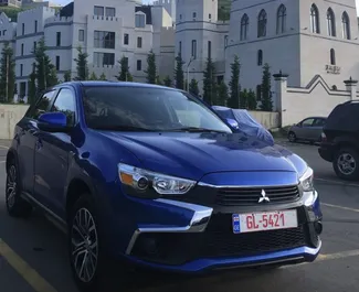 Vooraanzicht van een huurauto Mitsubishi Outlander Sport in Tbilisi, Georgië ✓ Auto #7216. ✓ Transmissie Automatisch TM ✓ 1 beoordelingen.