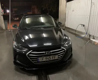 Vooraanzicht van een huurauto Hyundai Elantra in Tbilisi, Georgië ✓ Auto #7381. ✓ Transmissie Automatisch TM ✓ 0 beoordelingen.