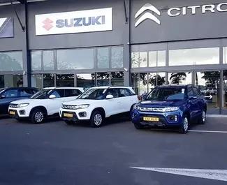 Vooraanzicht van een huurauto Suzuki Vitara Brezza op Mauritius Luchthaven, Mauritius ✓ Auto #7382. ✓ Transmissie Automatisch TM ✓ 0 beoordelingen.