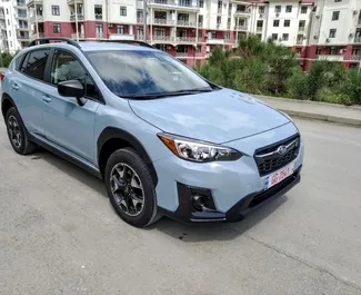 Vooraanzicht van een huurauto Subaru Crosstrek in Tbilisi, Georgië ✓ Auto #7570. ✓ Transmissie Automatisch TM ✓ 1 beoordelingen.