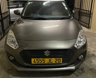 Vooraanzicht van een huurauto Suzuki Swift in Mauritius, Mauritius ✓ Auto #7461. ✓ Transmissie Automatisch TM ✓ 0 beoordelingen.