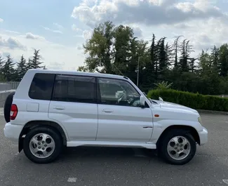 Autohuur Mitsubishi Pajero Io #7774 Automatisch in Koetaisi, uitgerust met 2,0L motor ➤ Van Dima in Georgië.