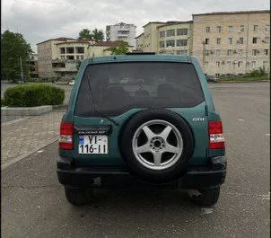 Autohuur Mitsubishi Pajero Io #7748 Automatisch in Koetaisi, uitgerust met 1,8L motor ➤ Van Dima in Georgië.