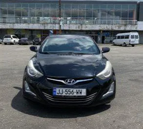 Vooraanzicht van een huurauto Hyundai Elantra in Koetaisi, Georgië ✓ Auto #7746. ✓ Transmissie Automatisch TM ✓ 0 beoordelingen.