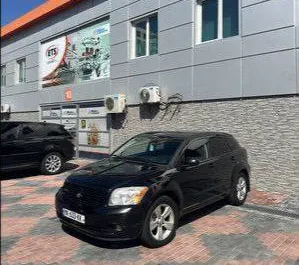 Vooraanzicht van een huurauto Dodge Caliber in Tbilisi, Georgië ✓ Auto #7737. ✓ Transmissie Automatisch TM ✓ 0 beoordelingen.