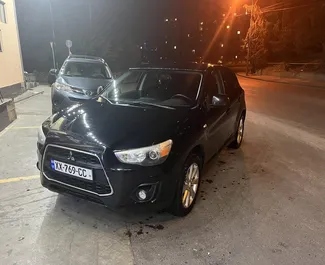 Vooraanzicht van een huurauto Mitsubishi Outlander Sport in Tbilisi, Georgië ✓ Auto #7871. ✓ Transmissie Automatisch TM ✓ 1 beoordelingen.