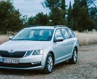 Vooraanzicht van een huurauto Skoda Octavia Combi in Podgorica, Montenegro ✓ Auto #7360. ✓ Transmissie Automatisch TM ✓ 0 beoordelingen.