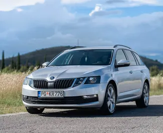 Vooraanzicht van een huurauto Skoda Octavia Combi in Podgorica, Montenegro ✓ Auto #4707. ✓ Transmissie Automatisch TM ✓ 5 beoordelingen.