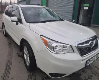 Vooraanzicht van een huurauto Subaru Forester in Tbilisi, Georgië ✓ Auto #8046. ✓ Transmissie Automatisch TM ✓ 1 beoordelingen.