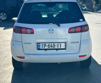 Verhuur Mazda Demio. Economy Auto te huur in Georgië ✓ Borg van Zonder Borg ✓ Verzekeringsmogelijkheden TPL, FDW, Passagiers, Diefstal.