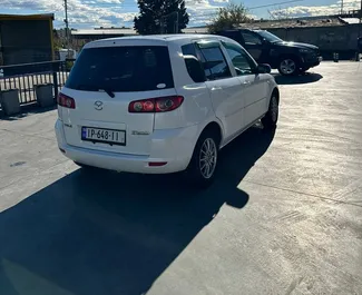 Benzine motor van 1,3L van Mazda Demio 2003 te huur in Tbilisi.