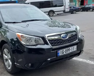 Vooraanzicht van een huurauto Subaru Forester in Tbilisi, Georgië ✓ Auto #8047. ✓ Transmissie Automatisch TM ✓ 0 beoordelingen.