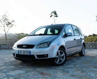 Vooraanzicht van een huurauto Ford C-Max in Durrës, Albanië ✓ Auto #8212. ✓ Transmissie Automatisch TM ✓ 0 beoordelingen.