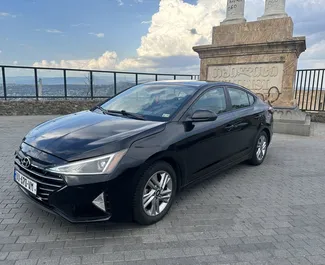 Vooraanzicht van een huurauto Hyundai Elantra in Tbilisi, Georgië ✓ Auto #8204. ✓ Transmissie Automatisch TM ✓ 0 beoordelingen.