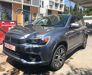 Vooraanzicht van een huurauto Mitsubishi Outlander Sport in Tbilisi, Georgië ✓ Auto #7211. ✓ Transmissie Automatisch TM ✓ 1 beoordelingen.