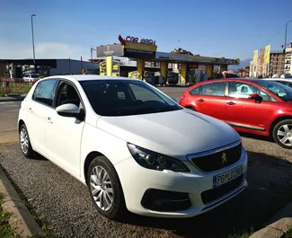 Vooraanzicht van een huurauto Peugeot 308 in Podgorica, Montenegro ✓ Auto #8792. ✓ Transmissie Handmatig TM ✓ 0 beoordelingen.