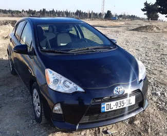 Autohuur Toyota Prius C 2014 in in Georgië, met Benzine brandstof en 99 pk ➤ Vanaf 78 GEL per dag.