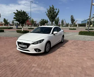 Vooraanzicht van een huurauto Mazda 3 in Jerevan, Armenië ✓ Auto #9124. ✓ Transmissie Automatisch TM ✓ 0 beoordelingen.