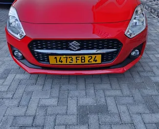 Vooraanzicht van een huurauto Suzuki Swift in Mauritius, Mauritius ✓ Auto #9353. ✓ Transmissie Automatisch TM ✓ 0 beoordelingen.