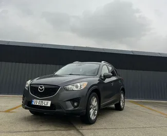 Vooraanzicht van een huurauto Mazda CX-5 in Tbilisi, Georgië ✓ Auto #9530. ✓ Transmissie Automatisch TM ✓ 0 beoordelingen.