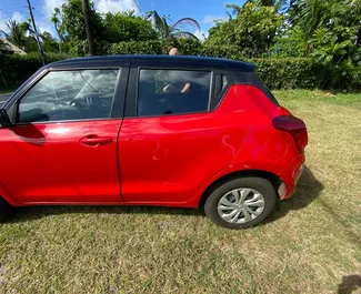 Vooraanzicht van een huurauto Suzuki Swift in Mauritius, Mauritius ✓ Auto #9420. ✓ Transmissie Automatisch TM ✓ 0 beoordelingen.