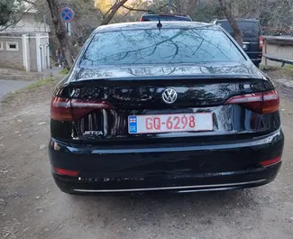 Interieur van Volkswagen Jetta te huur in Georgië. Een geweldige auto met 5 zitplaatsen en een Automatisch transmissie.