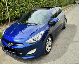 Vooraanzicht van een huurauto Hyundai i30 in Tirana, Albanië ✓ Auto #9659. ✓ Transmissie Automatisch TM ✓ 0 beoordelingen.