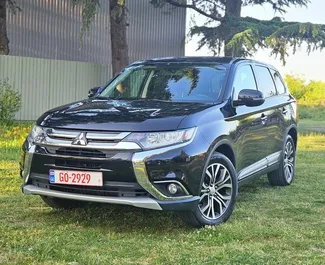 Vooraanzicht van een huurauto Mitsubishi Outlander Xl in Koetaisi, Georgië ✓ Auto #9790. ✓ Transmissie Automatisch TM ✓ 0 beoordelingen.