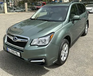 Vooraanzicht van een huurauto Subaru Forester in Tbilisi, Georgië ✓ Auto #9810. ✓ Transmissie Automatisch TM ✓ 0 beoordelingen.