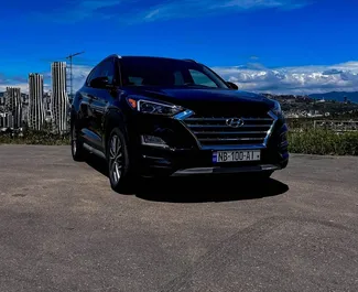 Vooraanzicht van een huurauto Hyundai Tucson in Tbilisi, Georgië ✓ Auto #9591. ✓ Transmissie Automatisch TM ✓ 0 beoordelingen.