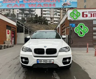 Vooraanzicht van een huurauto BMW X6 in Tbilisi, Georgië ✓ Auto #9660. ✓ Transmissie Automatisch TM ✓ 0 beoordelingen.