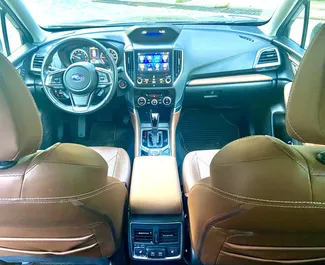 Interieur van Subaru Forester Limited te huur in Georgië. Een geweldige auto met 5 zitplaatsen en een Automatisch transmissie.