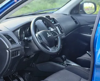 Interieur van Mitsubishi Outlander Sport te huur in Georgië. Een geweldige auto met 5 zitplaatsen en een Automatisch transmissie.