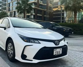 Vooraanzicht van een huurauto Toyota Corolla Sedan in Dubai, Verenigde Arabische Emiraten ✓ Auto #9933. ✓ Transmissie Automatisch TM ✓ 0 beoordelingen.