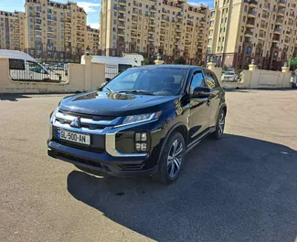 Vooraanzicht van een huurauto Mitsubishi Outlander Sport in Tbilisi, Georgië ✓ Auto #10129. ✓ Transmissie Automatisch TM ✓ 0 beoordelingen.