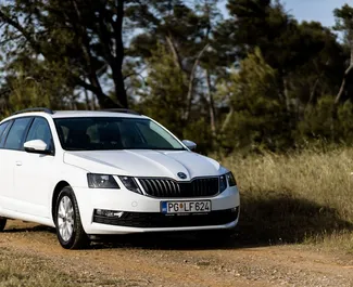 Vooraanzicht van een huurauto Skoda Octavia Combi in Podgorica, Montenegro ✓ Auto #6606. ✓ Transmissie Automatisch TM ✓ 1 beoordelingen.