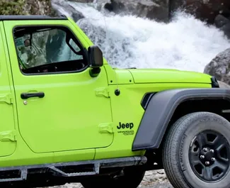 Jeep Wrangler Sahara 2021 beschikbaar voor verhuur in Tbilisi, met een kilometerlimiet van 250 km/dag.