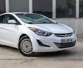 Vooraanzicht van een huurauto Hyundai Elantra in Tbilisi, Georgië ✓ Auto #10033. ✓ Transmissie Automatisch TM ✓ 0 beoordelingen.